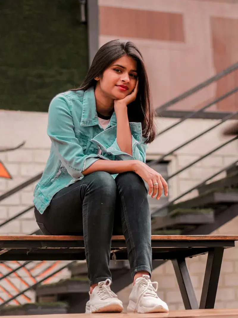 Community Investment Teen girl sitting on table