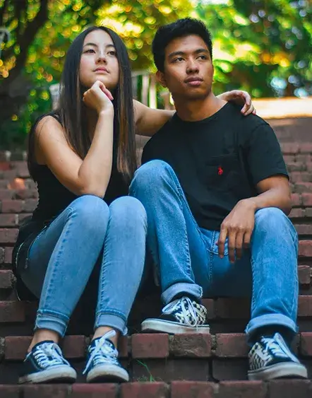 Join - Attend Events Teenage girl and boy sitting outside