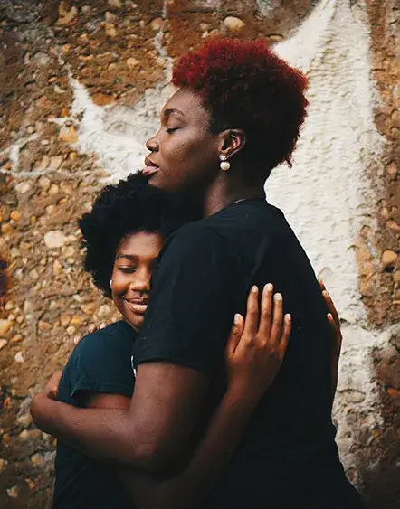 Join - Join Us Mother hugging child