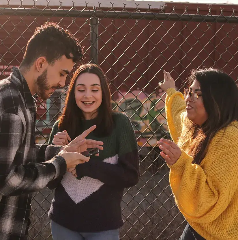 Momentum Makers Club Young adults talking to one another