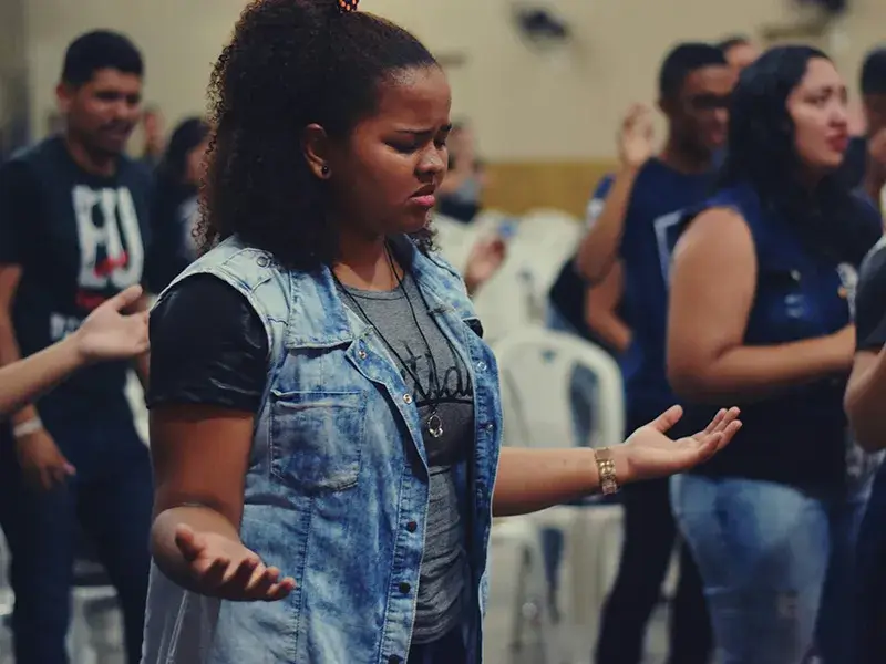 faith-leaders-2 A girl worshipping at church