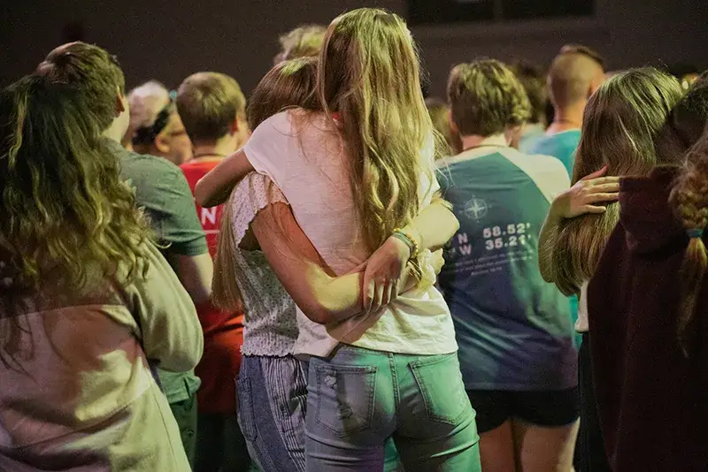 friends-hugging Two teenager friends hugging each other