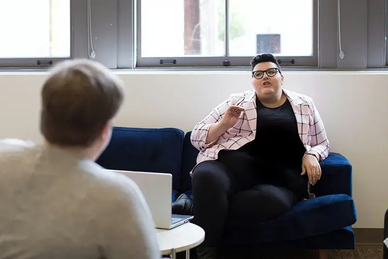 Two people in a meeting