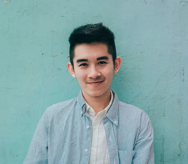need-facts A young adult guy smiling