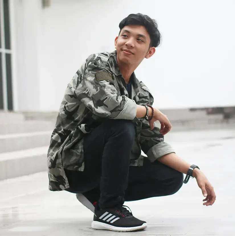 the-work-isnt-done A young man crouching down