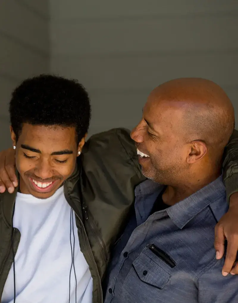 Father Son Laughing Father and son laughing together