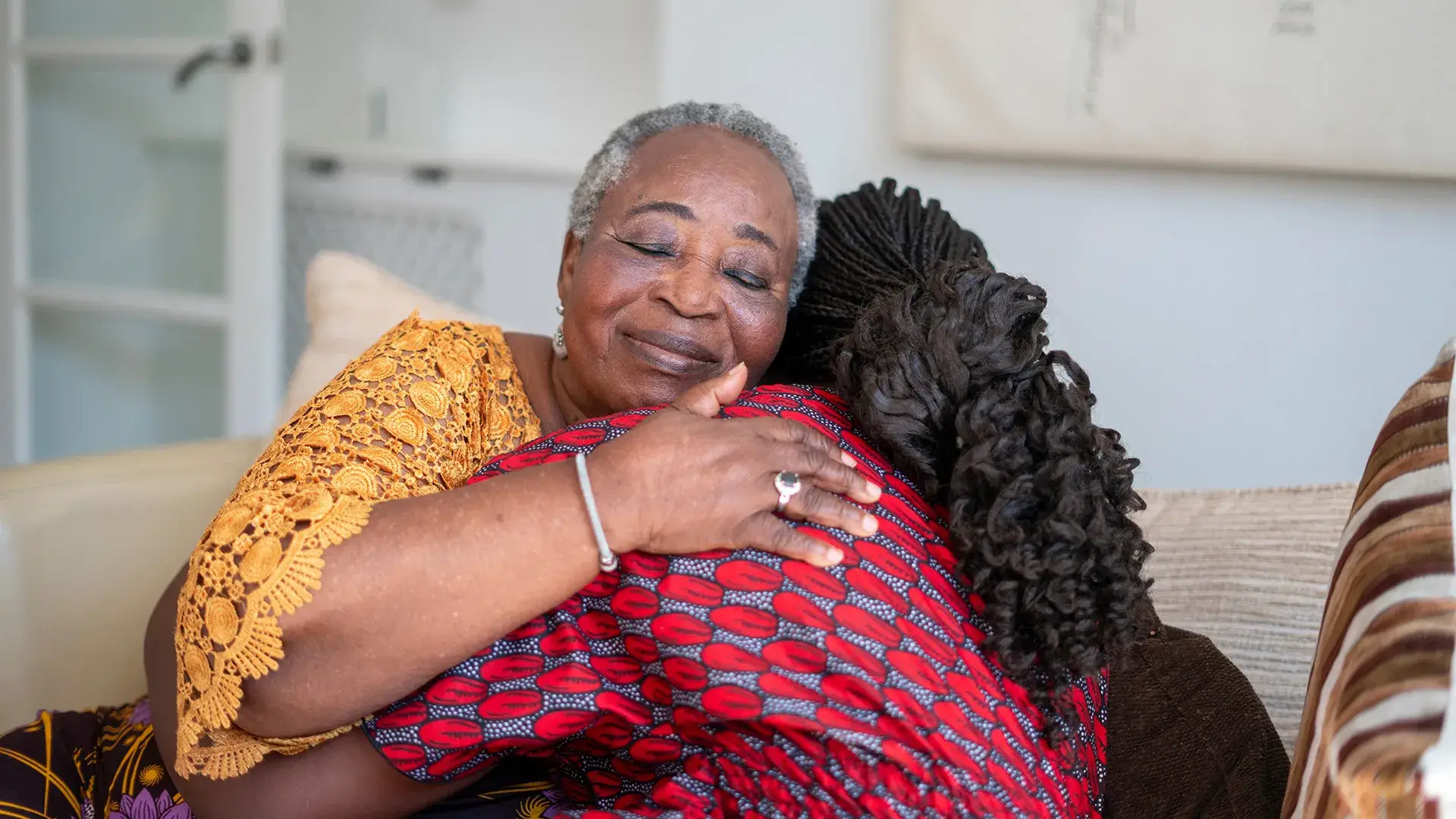 Good Reads for Big Talks Mother and daughter embracing
