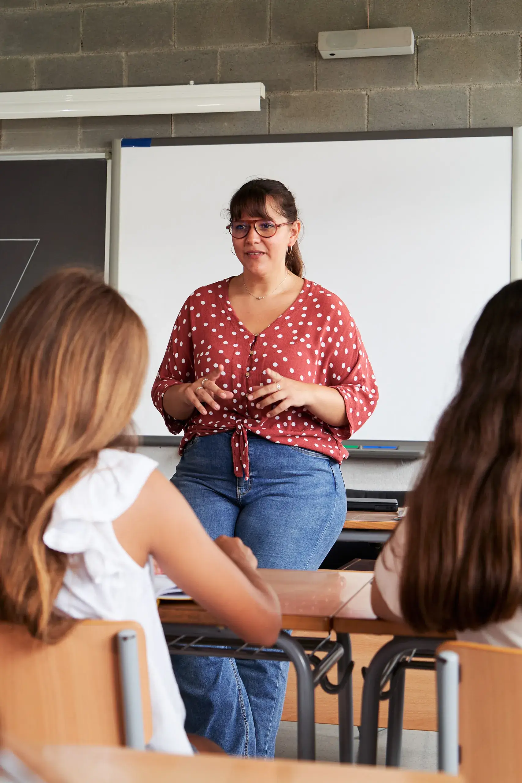 Working With Adolescents Teacher talking to students