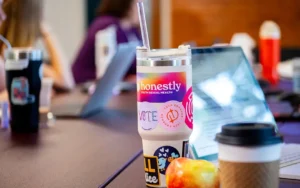 A water bottle covered in stickers