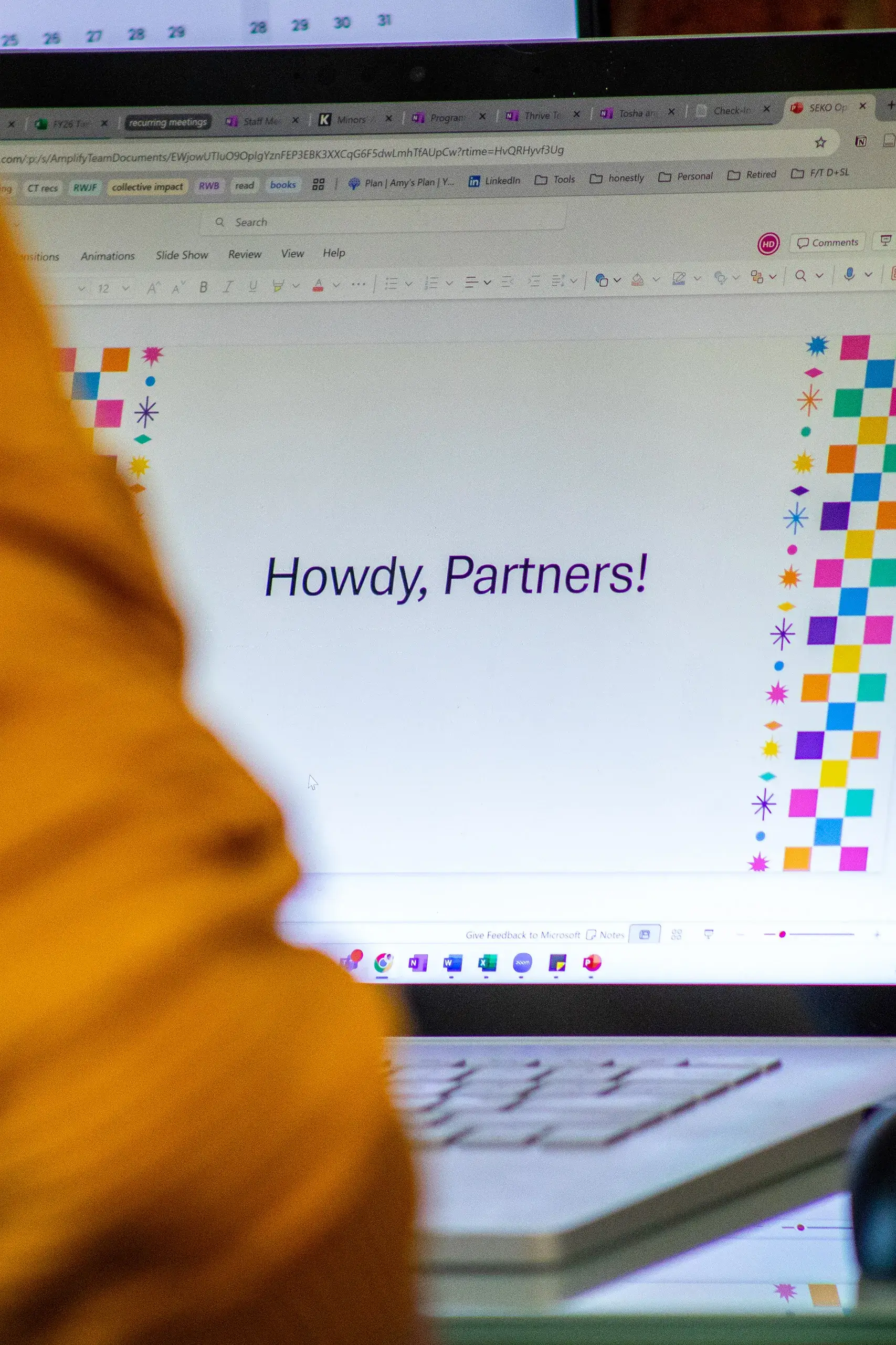 thank-yous A laptop screen showing a slideshow with "Howdy, Partners!" on the screen