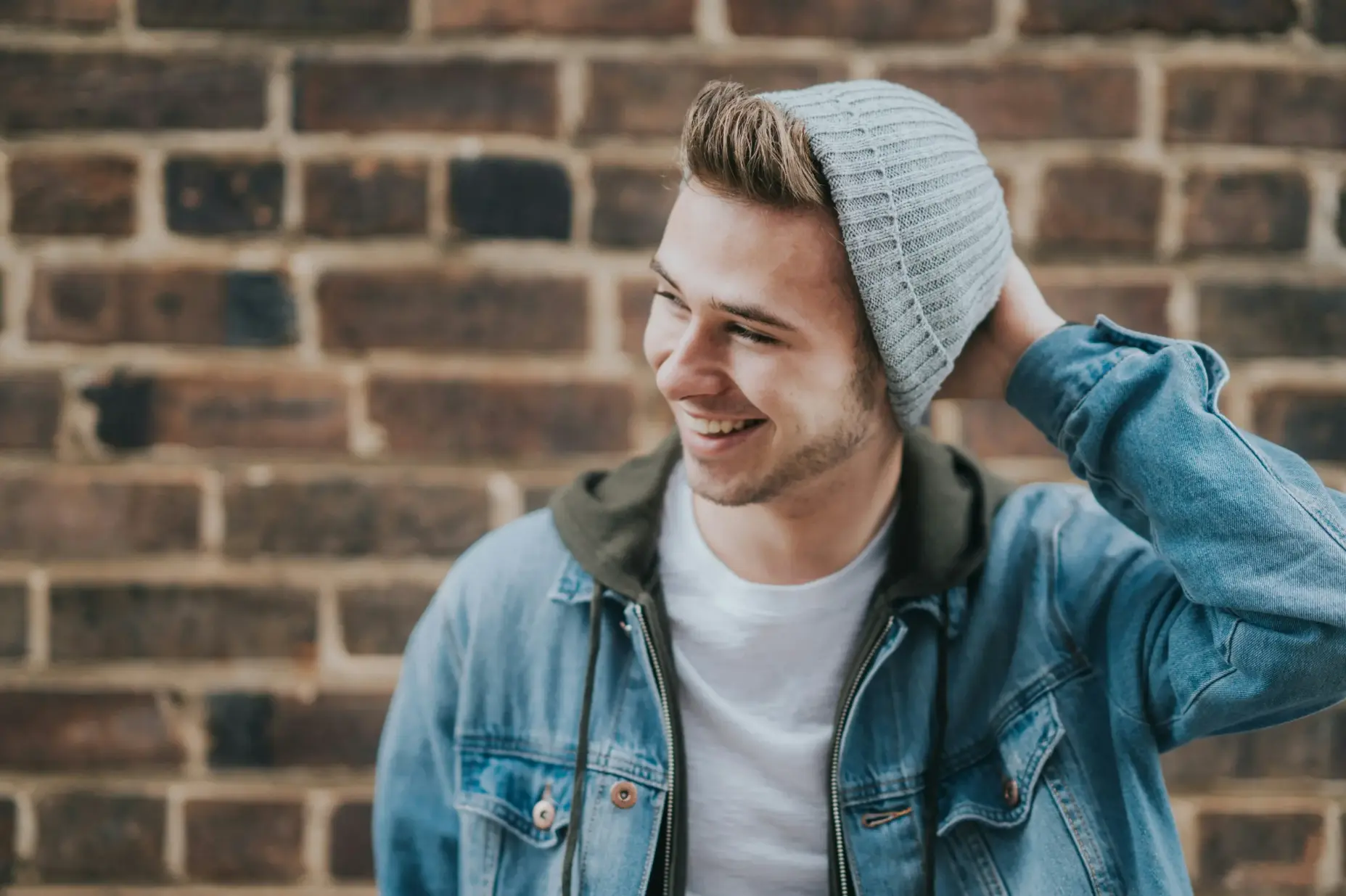 A teenage guy smiling